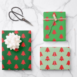 Simple Red Christmas Trees on Green Wrapping Paper Sheet