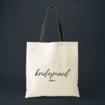 Simple Stylish Script Bridesmaid Personalized Name Tote Bag<br><div class="desc">Simple Stylish Script Bridesmaid Personalized Name
minimalist,  typography,  elegant,  modern,  script,  black,  trendy,  name bridesmaid wedding, </div>