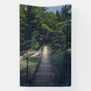 Simple suspension bridge river Idrijca, Slovenia Banner