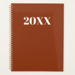 Simple terracotta modern typography year monogram planner<br><div class="desc">Minimalist terracotta and white modern typography custom simple elegant Planner.
Custom white serif text,  terracotta solid plain background.
You can personalized it with your name,  initials,  monogram,  year,  etc or just delete the text,  and leave the black solid plain black colour.</div>