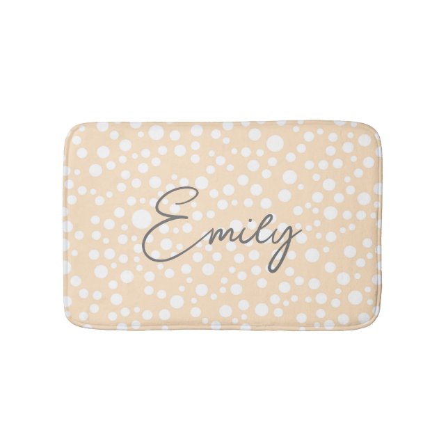 Simple white dotted pattern on peach background  bath mat (Front)