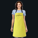 Simple Yellow black Chic Elegant Name Script Apron<br><div class="desc">"Radiant in the Kitchen: Simple Yellow & Black Chic Elegant Name Script Apron 🌼 Sunshine in Every Stitch: Greet each culinary or creative adventure with a burst of bright and uplifting yellow. Our aprons are not just protective wear; they're a piece of wearable joy, bringing a dash of sunny cheer...</div>