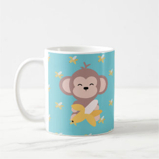 Singe mignon de Kawaii avec la tasse de banane