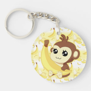 Singe mignon de Kawaii tenant la banane