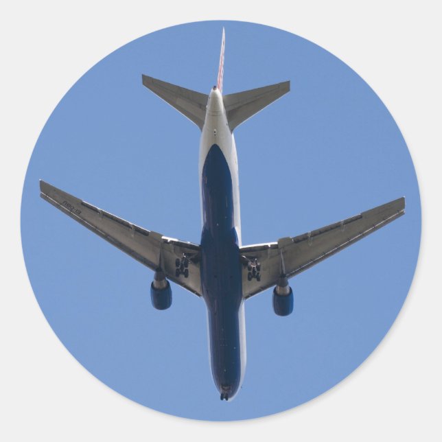 Single airplane on the blue sky background classic round sticker (Front)