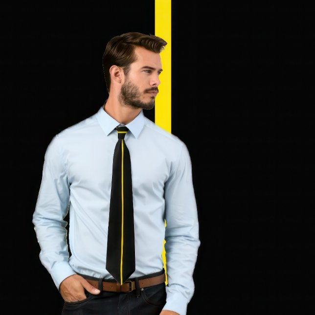 Single Gold Stripe on Black Tie (Man wears a necktie with a single thin golden yellow vertical stripe on black.)