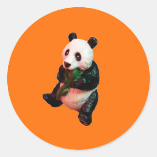 Single Pada Bear Eatting Bamboo Orange Background Classic Round Sticker