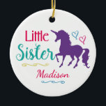 Sisters Colourful Unicorn Little Sister Christmas Ceramic Ornament<br><div class="desc">Sisters Colourful Unicorn Little Sister Personalized Christmas Ornament. Personalize this adorable ornament with name underneath a beautiful purple unicorn silhouette. Text in hot pink and turquoise reads LITTLE SISTER with pretty hearts in blue and pink and underlined in curling lines of blue and yellow. Back of ornament has place for...</div>
