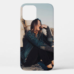 Sitting and smiling woman wearing black pants iPhone 12 case