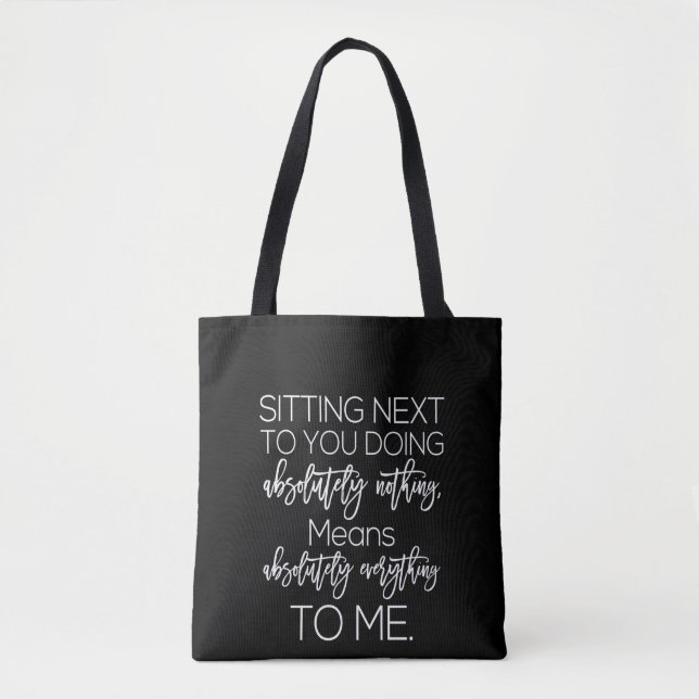 sitting next to you doing absolutely nothing tote bag (Front)