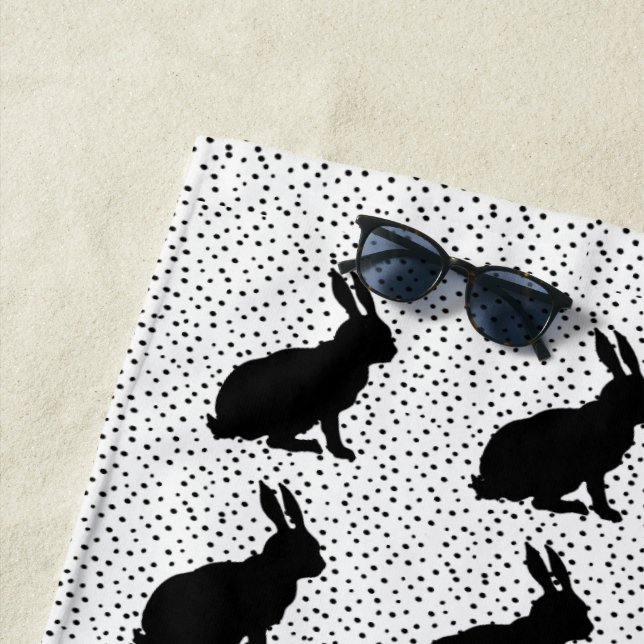 Sitting Rabbits in Black Silhouette Polka Dots Beach Towel (In Situ)