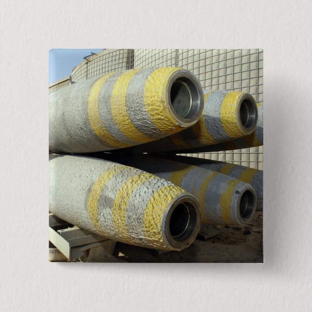 Six GBU-12 bombs sit in a rack 2 Inch Square Button (Front)