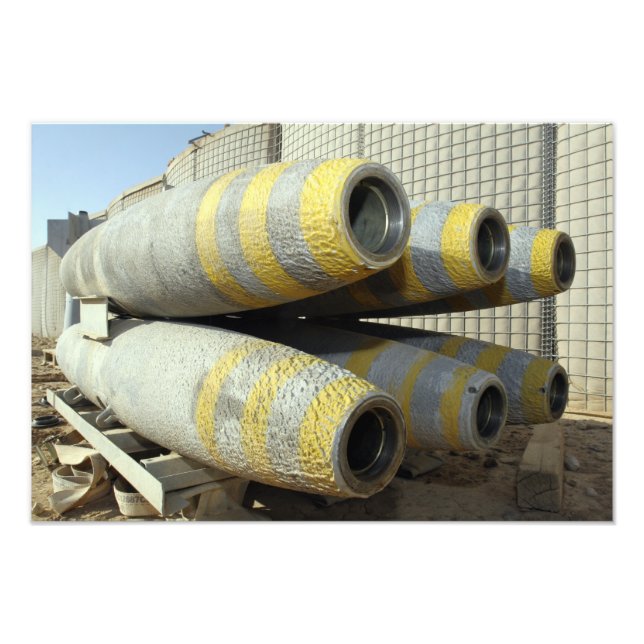 Six GBU-12 bombs sit in a rack Photo Print (Front)