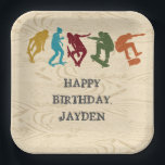 Skate Park Skateboarding Themed Teen Boys Birthday Paper Plate<br><div class="desc">Create custom party supplies with a skateboarding theme. These skate park paper plates feature illustrations of skateboarders in rust orange, turquoise blue, dark red, mustard yellow and green set against a faux woodgrain background. The text is in charcoal grey and all of it is ready to be customized with your...</div>