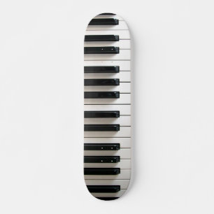 Skateboard clavier piano noir et blanc