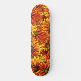 Skateboard Fleurs de soleil orange