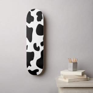 Skateboard Impression de vache noire et blanche