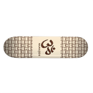 Skateboard Namaste avec son symbole Om Brown et sa crème