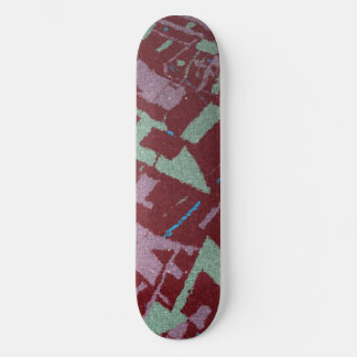 Skateboard Rouge à section dorée