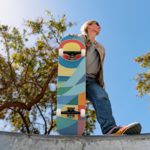 Skateboard Vague océane au lever du soleil