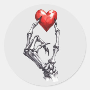 Skeleton Hand Pinching Red Heart Classic Round Sticker