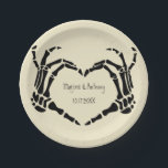 Skeleton Hands Heart Shape Custom Wedding Paper Plate<br><div class="desc">Add a creepy, personalized touch to your wedding with these paper plates. These disposable plates are cream or ivory coloured and feature an illustration of skeleton hands in a heart shape framing the bride and groom's names and wedding date. The graphic and text are in a black. The macabre style...</div>