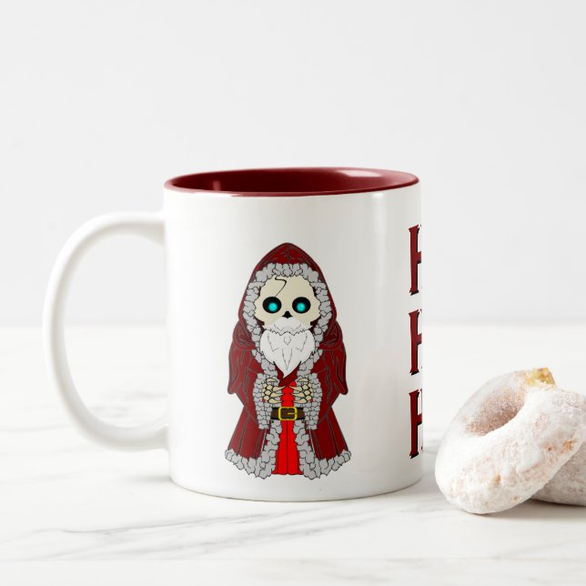 Skeleton in a Santa Suit. Seasonal Two-Tone Coffee Mug (With Donut)