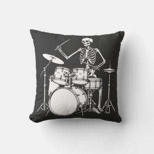 Skeleton plays the drums in rock band throw pillow