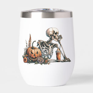 Skeleton with pumpkin and drink. Halloween