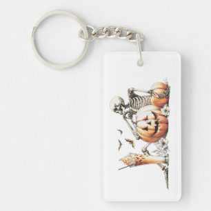 Skeleton with pumpkin and drink. Halloween. Keychain