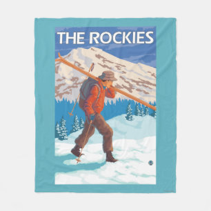 Skier Carrying Snow Skis - The Rockies Fleece Blanket