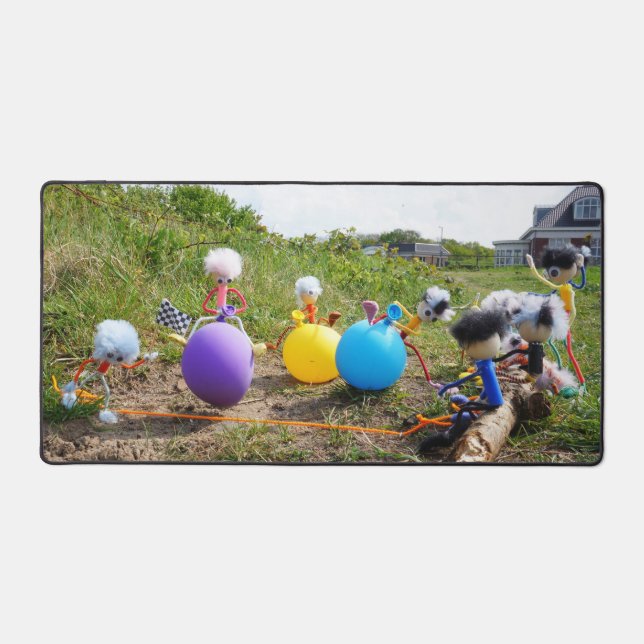Skippie ball race by Fubby dolls on balloons. Desk Mat (Front)