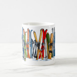 Skis and snowboards in the snow. coffee mug