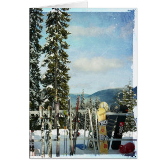 Skis and Snowboards on Mountain Top