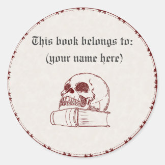 Skull and a book classic round sticker
