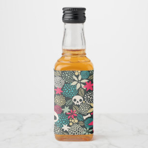 Skull in flowers liquor bottle label