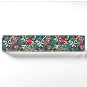 Skull in flowers nameplate