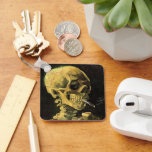Skull with Burning Cigarette by Vincent van Gogh Keychain<br><div class="desc">Skull with Burning Cigarette by Vincent van Gogh is a vintage fine art post impressionism still life painting. A portrait of human skeleton smoking. Great image to use for anti-smoking products. Smoking kills 1, 000s every year, help someone to quit smoking today. Great image for Halloween or Día de los...</div>