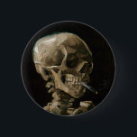 Skull with Burning Cigarette Vincent van Gogh Art 2 Inch Round Button<br><div class="desc">Vincent van Gogh (Dutch, 1853 - 1890) Skull of a Skeleton with Burning Cigarette, 1885–86, Oil on canvas Unframed: 32 cm × 24.5 cm (13 in × 9.6 in) Early work by Vincent van Gogh. This small painting is part of the permanent collection of the Van Gogh Museum in Amsterdam....</div>