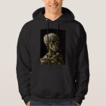 Skull with Burning Cigarette Vincent van Gogh Art Hoodie<br><div class="desc">Vincent van Gogh (Dutch, 1853 - 1890) Skull of a Skeleton with Burning Cigarette, 1885–86, Oil on canvas Unframed: 32 cm × 24.5 cm (13 in × 9.6 in) Early work by Vincent van Gogh. This small painting is part of the permanent collection of the Van Gogh Museum in Amsterdam....</div>