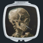 Skull with Burning Cigarette Vincent van Gogh Art Mirror For Makeup<br><div class="desc">Vincent van Gogh (Dutch, 1853 - 1890) Skull of a Skeleton with Burning Cigarette, 1885–86, Oil on canvas Unframed: 32 cm × 24.5 cm (13 in × 9.6 in) Early work by Vincent van Gogh. This small painting is part of the permanent collection of the Van Gogh Museum in Amsterdam....</div>