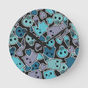 Skulls, and hearts on black background 2 round clock