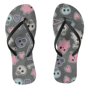 Skulls, and hearts on black background flip flops