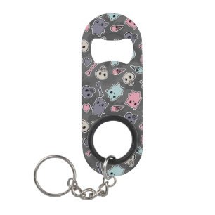 Skulls, and hearts on black background mini bottle opener