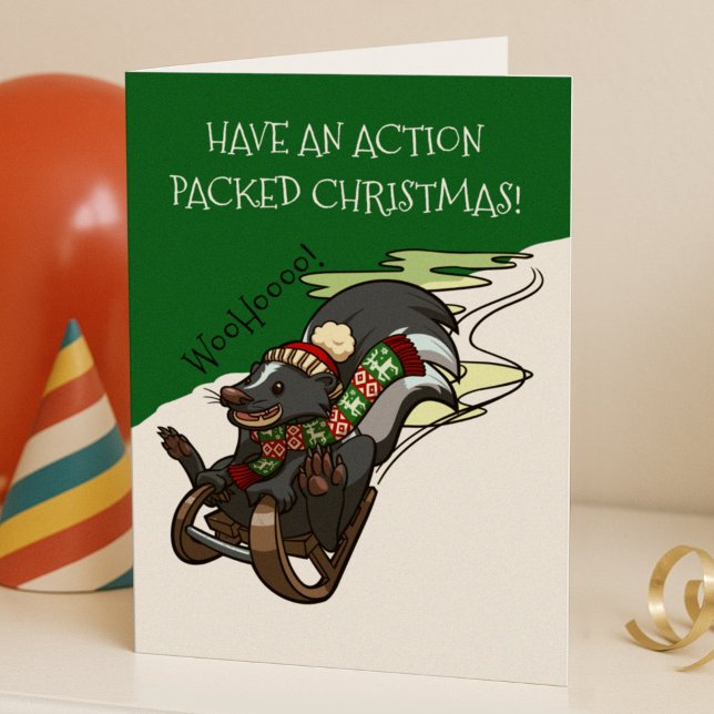 Skunk On A Sled Action Christmas Sledging Cartoon Holiday Card (Creator Uploaded)