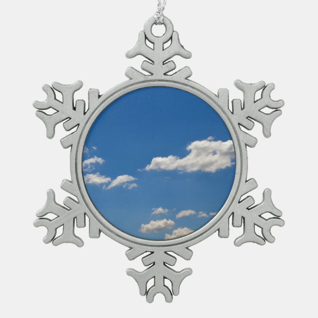Sky is blue and white clouds are passing by  snowflake pewter christmas ornament (Front)