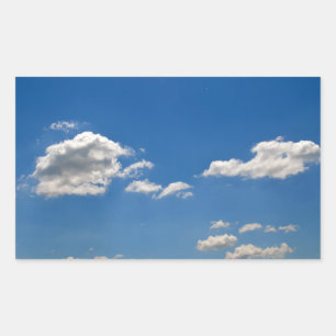 Sky is blue and white clouds are passing by sticker