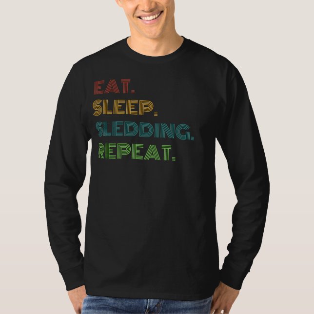 Sledding Laughs: Eat, Sleep, Sledding Repeat Funny T-Shirt (Front)