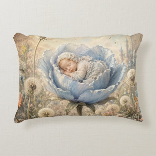 Sleeping baby in blue flower accent pillow