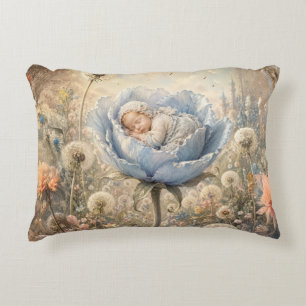 Sleeping baby in blue flower accent pillow